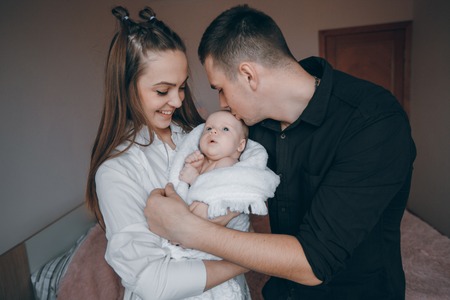 young family with infantの写真素材