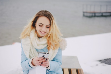 beautiful girl on winter walkの写真素材