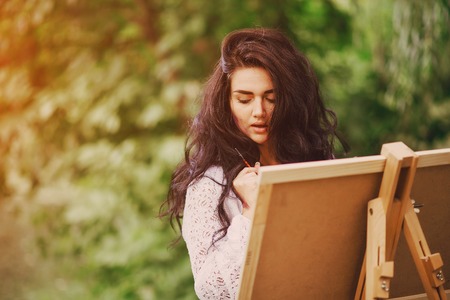 Artist girl in parkの写真素材