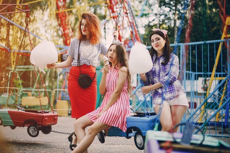 Three girls on a walkの写真素材