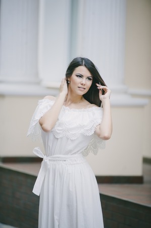 brunette in a dressの写真素材