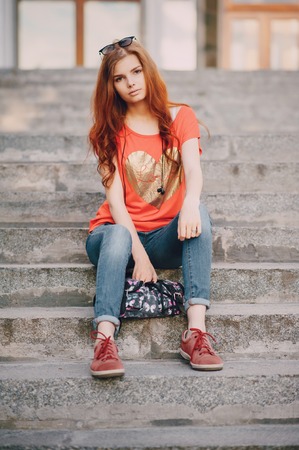 three young girls walking in the parkの写真素材