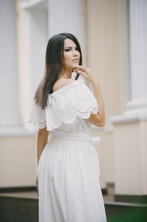 brunette in a dressの写真素材