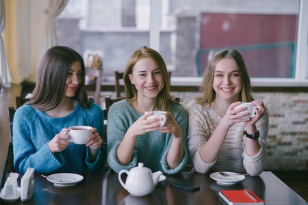 girls in cafeの写真素材