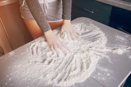 Girl in the kitchenの写真素材
