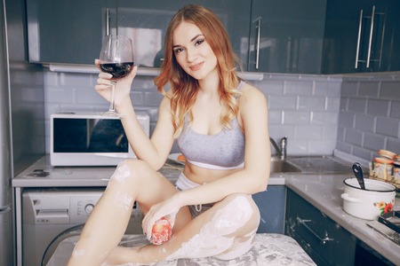 Girl in the kitchenの写真素材