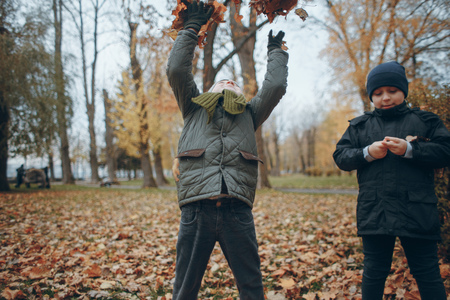 brothers in a parkの写真素材