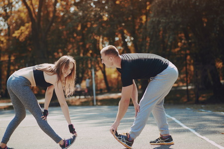 man and woman in parkの写真素材