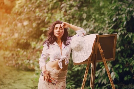 Artist girl in parkの写真素材