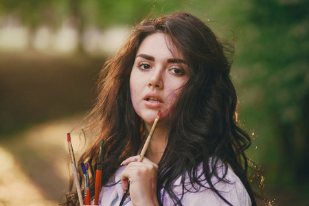 Artist girl in parkの写真素材