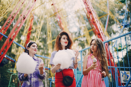Three girls on a walkの写真素材