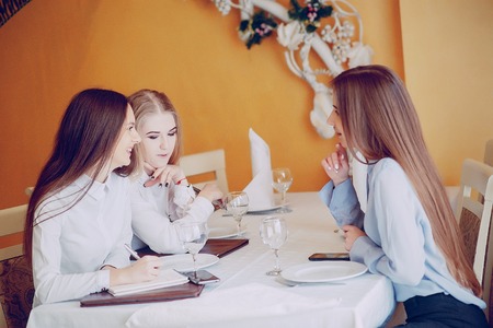 Girl in a restaurantの写真素材