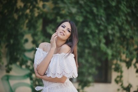 brunette in a dressの写真素材