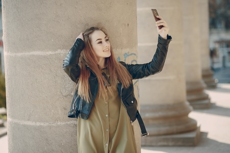 girl with phoneの写真素材