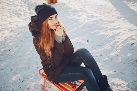 girl walking in a winter city