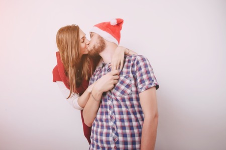 loving couple decorating Christmas treeの写真素材