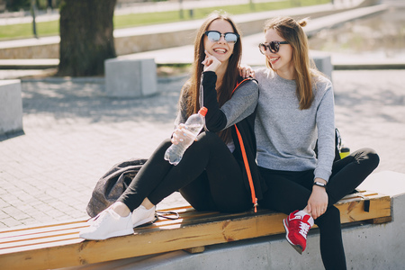 sporty girls in the parkの写真素材
