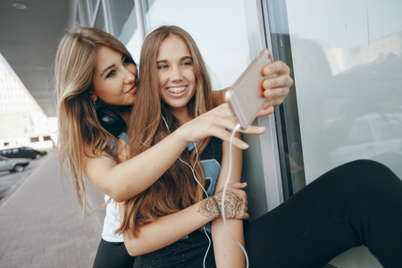 girls with headphoneの写真素材