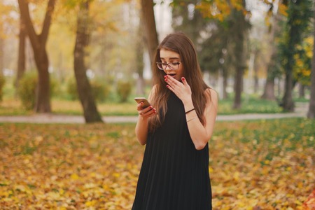 girl with phoneの写真素材