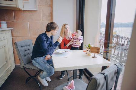 family in cafeの写真素材