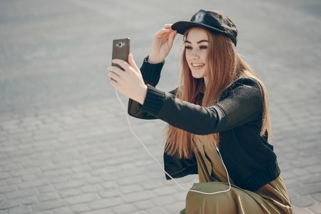 girl with phoneの写真素材