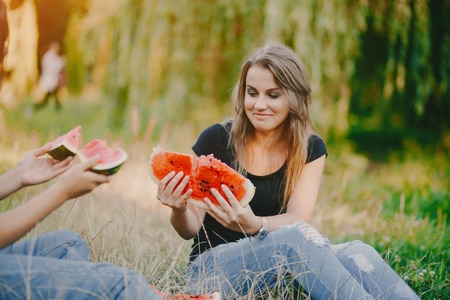 girls with watermelonの写真素材