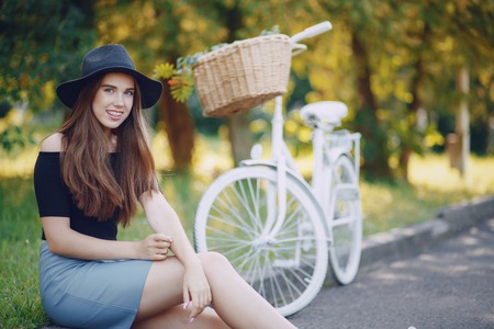 Girl with a bikeの写真素材