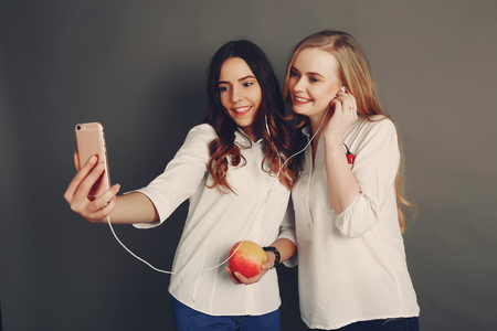 girls with fruitの写真素材