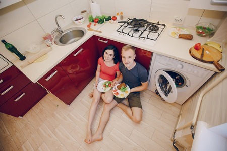 couple in a kitchenの写真素材