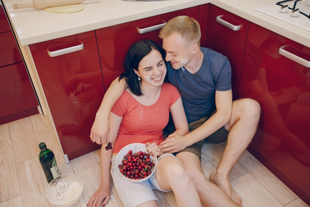couple in a kitchenの写真素材