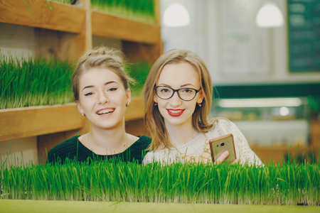 girls near grassの写真素材