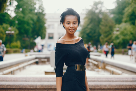 Stylish black girl in a parkの写真素材