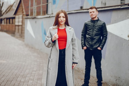 Loving couple walking around the river.の写真素材