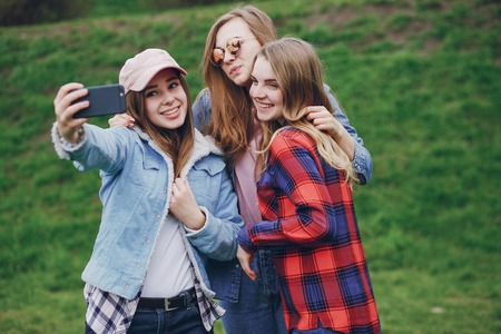 girls with phoneの写真素材