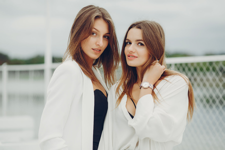 Fashion girls in a cityの写真素材