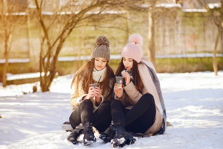 Happy girls in a winter city