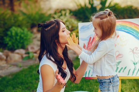Mother and daughter drawingの写真素材