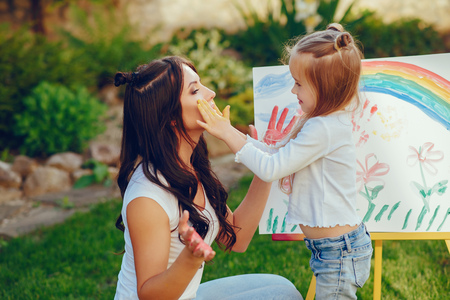 Mother and daughter drawingの写真素材