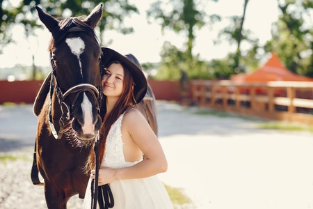 Girl with horseの写真素材