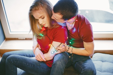 couple with garlandsの写真素材