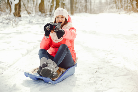 girl in a winter forestの写真素材