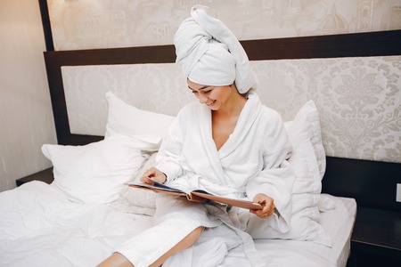 Girl in a bathrobeの写真素材