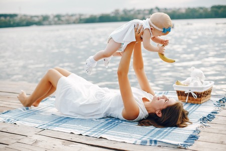 Mother with little daughtersの写真素材