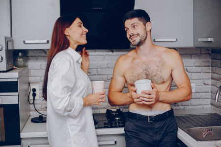 Cute couple at homeの写真素材