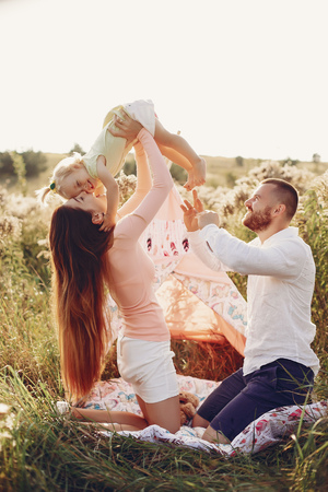 Family have fun in a parkの写真素材
