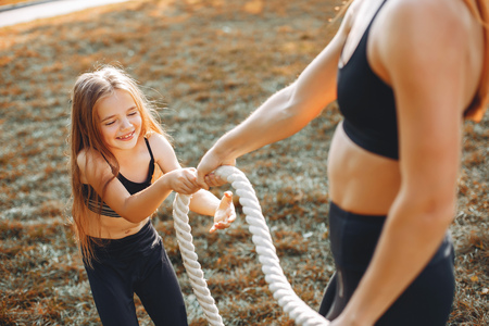 Sports family in a summer park