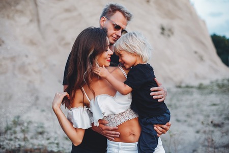 Stylish family in a parkの写真素材