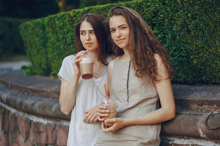 girls with coffeeの写真素材