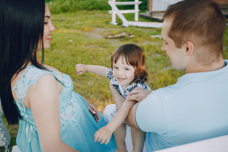 family on a swingの写真素材