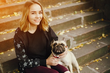 girl with pugの写真素材